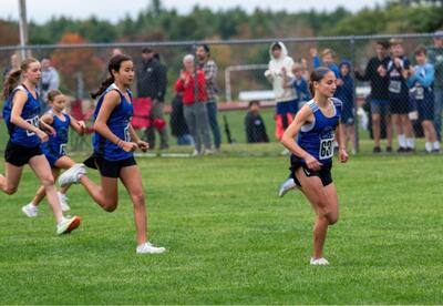 A group of Oyster River Middle School girls cross country competing during the 2026 Black Bear Invitational.