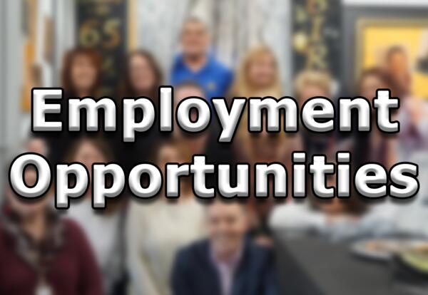 fuzzy image of a group of people with the words "Employment Opportunities"