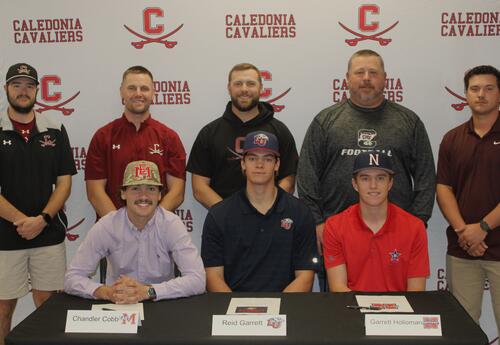 Caledonia High School baseball players with coaches