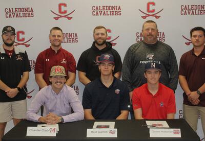 Caledonia High School baseball players with coaches