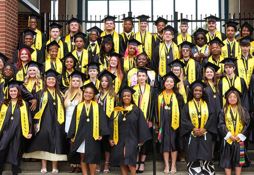 The St. Bernard-Elmwood Place graduating class of 2025 gathers together for a photo.