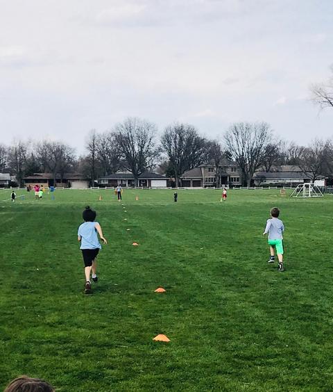 students running track