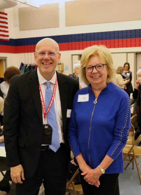 District 64 Superintendent Eric Olson poses with retired Superintendent Sally Pryor 