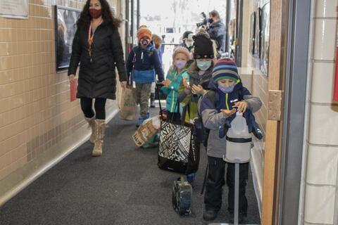 Roosevelt students file into school as in-person learning returns on Jan. 19.