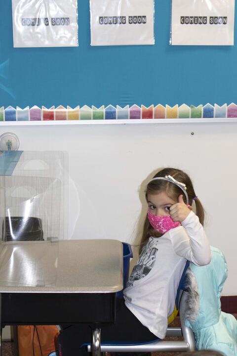 A Roosevelt first-grader answers her teacher in the affirmative during the first day back to in-person learning on Jan. 19.