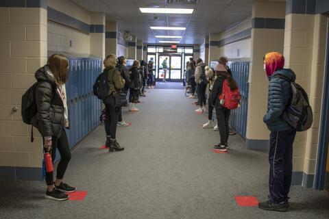 Emerson Middle School students wait to go to their homerooms on the first day back to in-person learning on Jan. 20. 