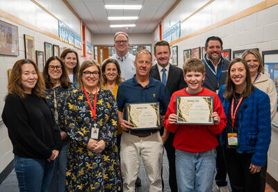 Field's Charlie Meachem and John Imber standing with the School Board