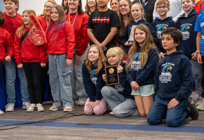 Franklin students pose with their winning plaque