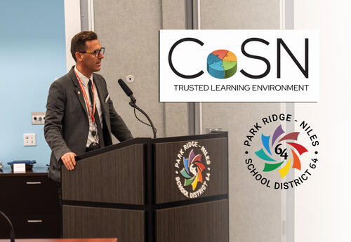 Director of Innovation and Technology Matt Tombs and CoSN's Mini Seal Award