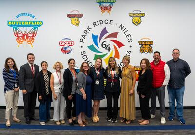 Jefferson Staff and District 64 Board Members/Superintendent stand in celebration of ExceleRate Award Honor.