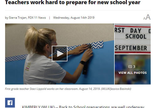 screen capture of the news story showing teacher Staci Lippold hanging decor in classroom