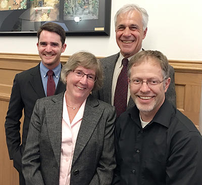 Carolyn with family and Bill at the capitol