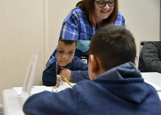 boy looking in mirror
