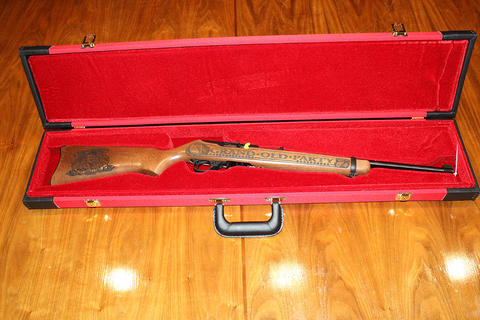 Ruger Grand Old Party .22 auto long rifle and case, etching of Donald Trump on butt of gun.