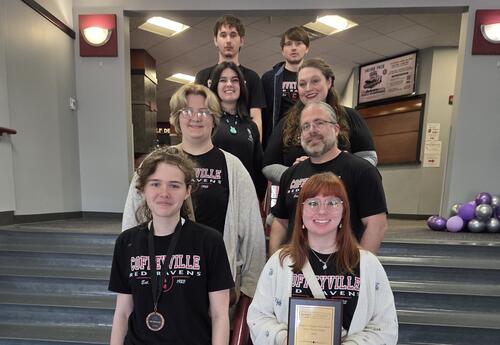 CCC Quiz Bowl Team pictured with CCC Instructor Ryan Butcher at State Tournament