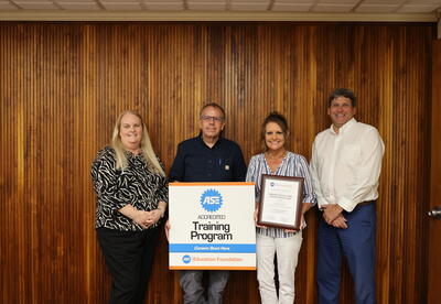Left to right: Heather Pollet, Vice President for Career & Technical Education; Hal Daniels, Automotive Collision & Refinishing Technology Instructor; Kari Soper, Columbus Campus Director; Dr. Marlon Thornburg, CCC President.
