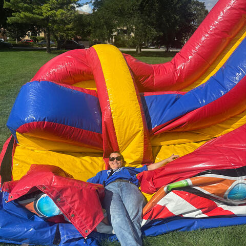 photo of staff on bouncy house