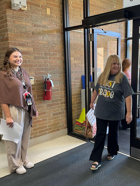 Staff welcomes Middleton students into the building on Day One