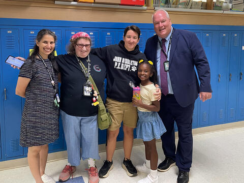 Photo of Superintendent Charlie Kyle with Middleton staff and staff