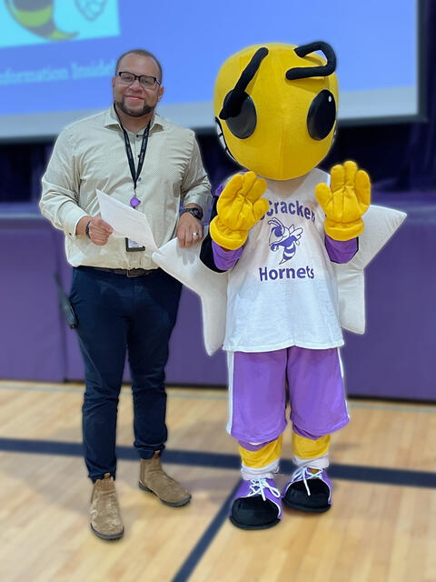 Photo of Assistant Principal Mr. Dykes with Ollie