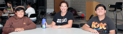 Students enjoying a pizza lunch with author Dana Alison Levy