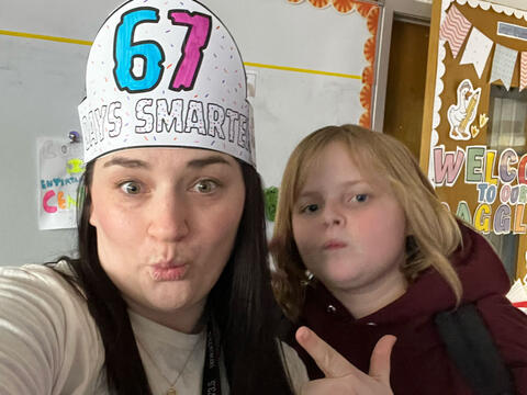 teacher and student celebrate 6 7 Day