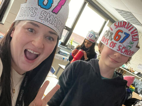 photo of teacher and student celebrating 6 7 Day