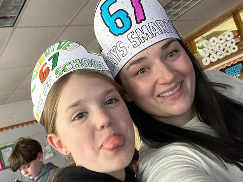 student and teacher celebrate 6 7 Day