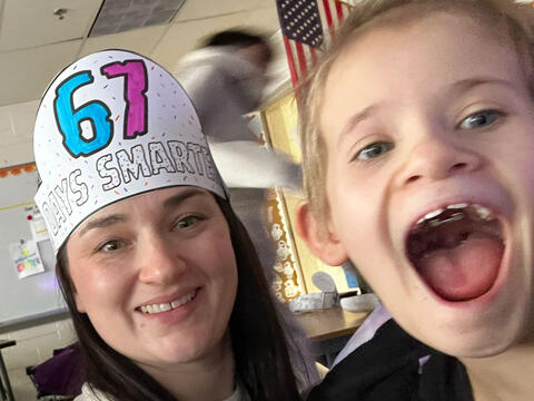 teacher and student celebrate 6 7 Day