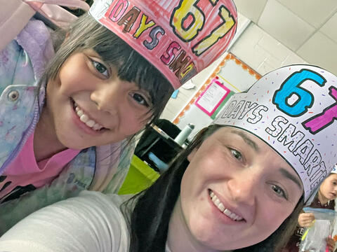 photo of student and teacher celebrating 6 7 Day