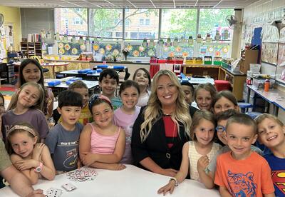 Superintendent Janice Pavelonis with students